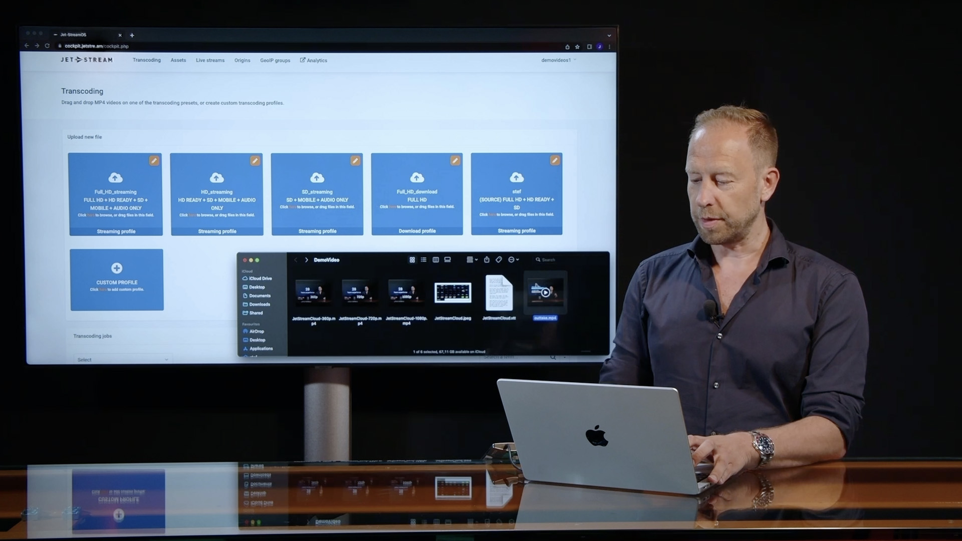 Presenter showing video upload and transcoding in Jet-Stream Cloud, demo thumbnail