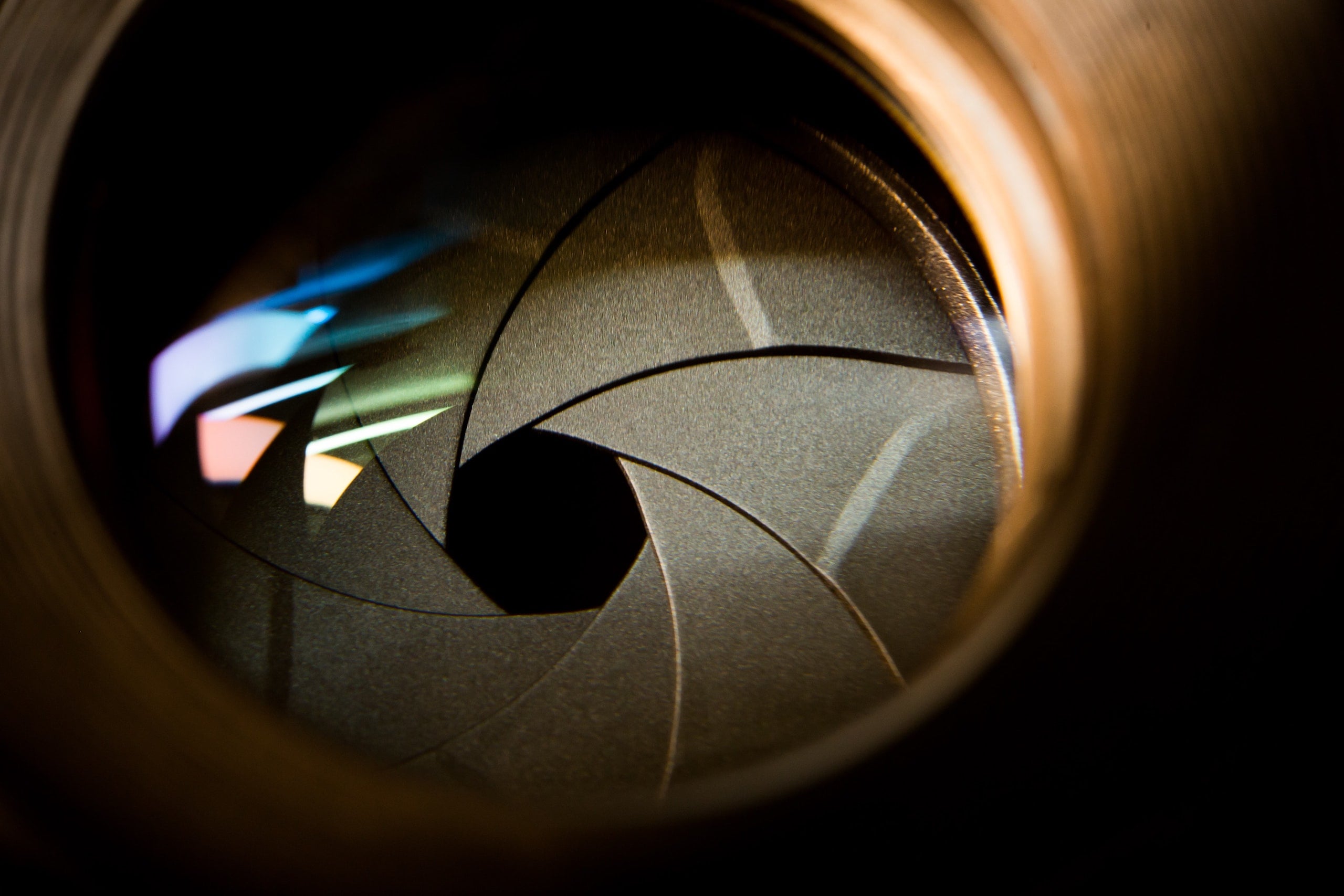 Close-up of a camera lens aperture
