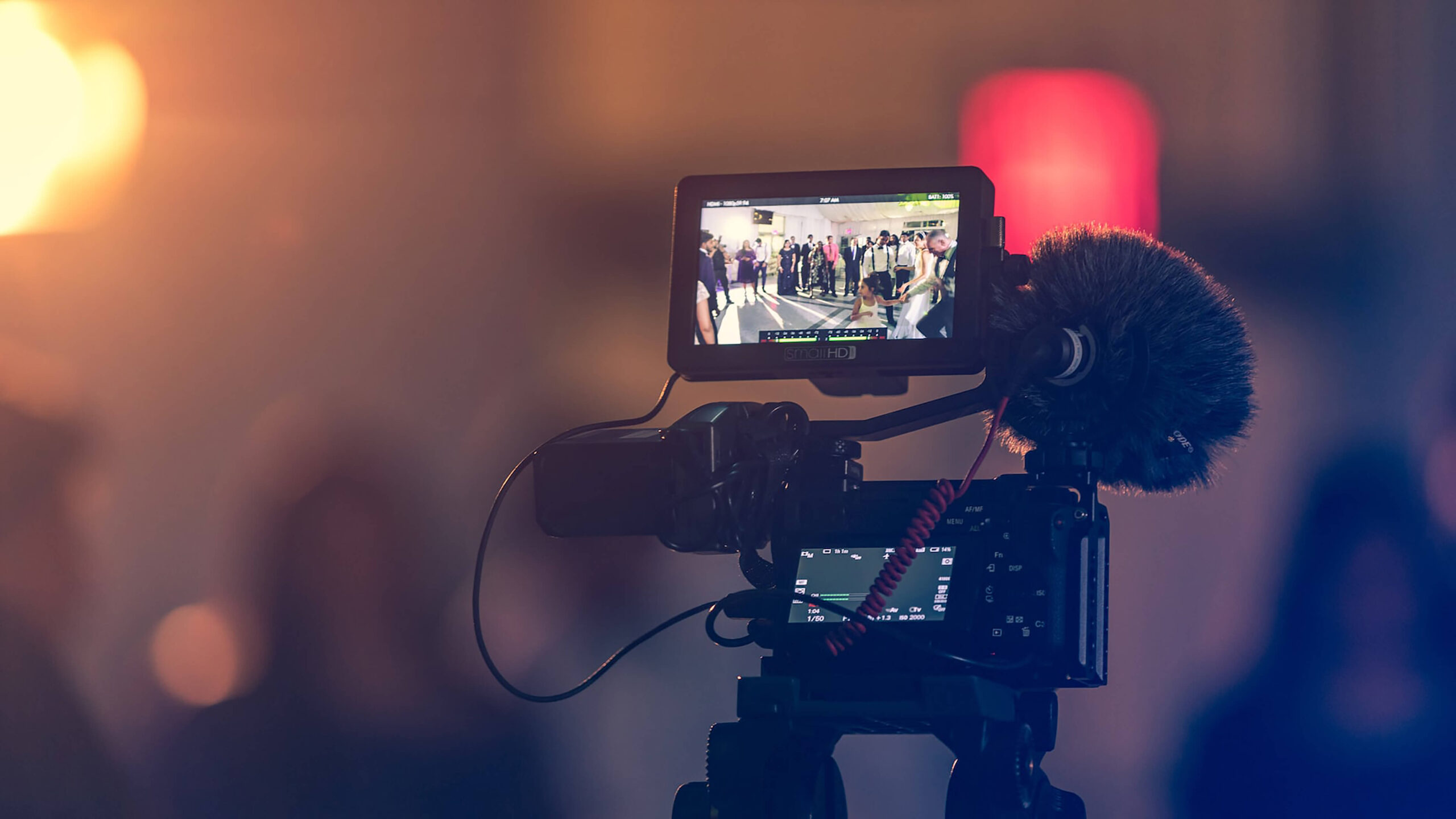 Camera filming a live event, header for the live streaming platform