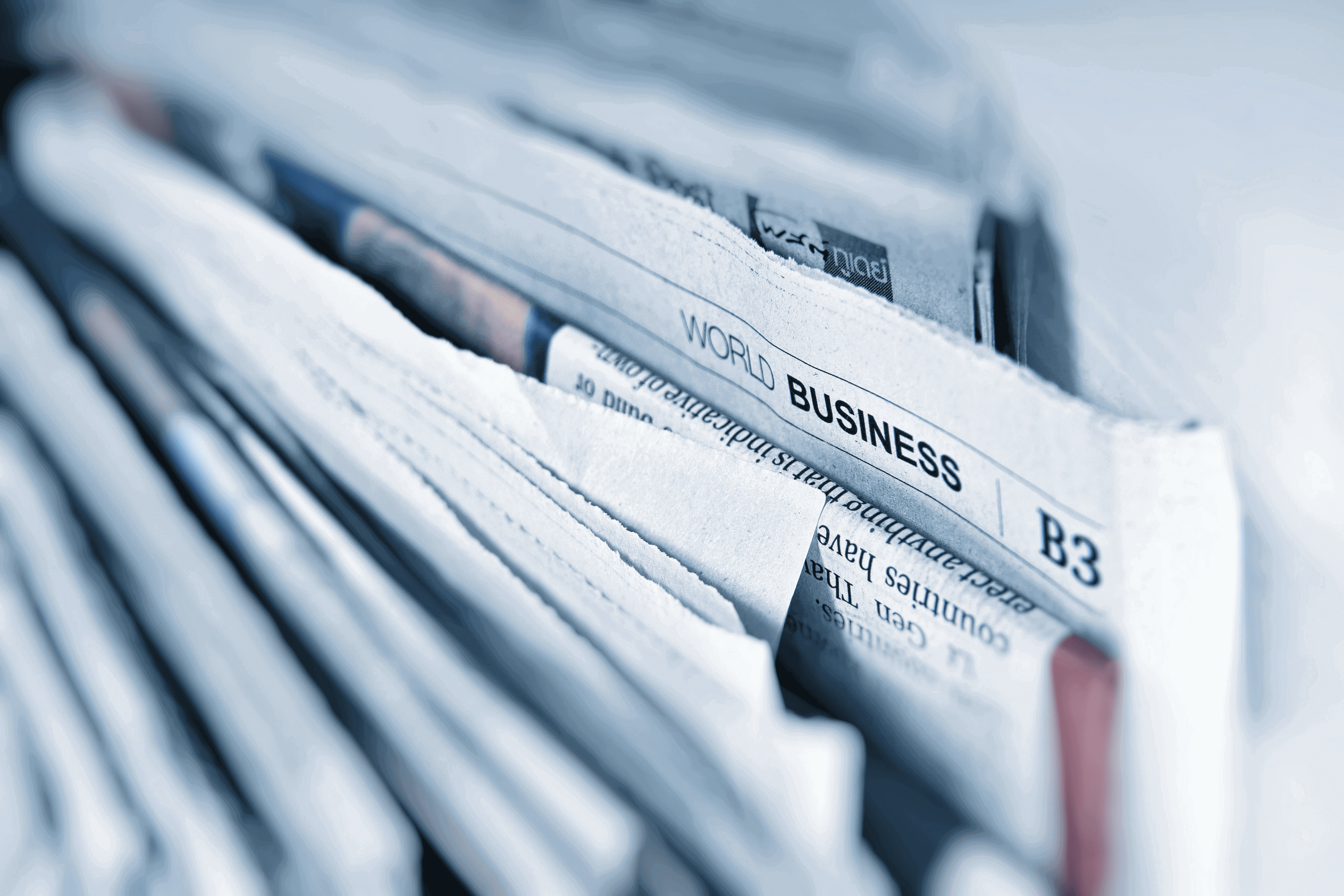 Stack of newspapers, header for streaming for publishers