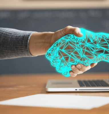 Human hand shaking a digital hand above a laptop, cover for streaming platforms for publishers