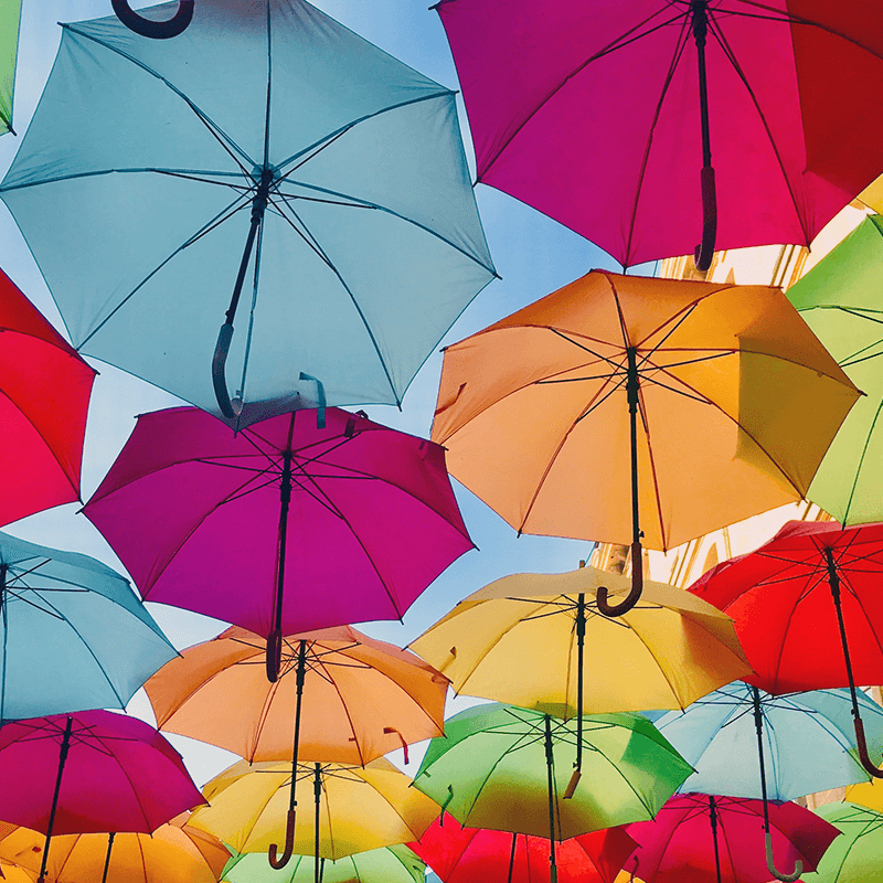 Colourful umbrellas, illustrating a multi-language online video platform