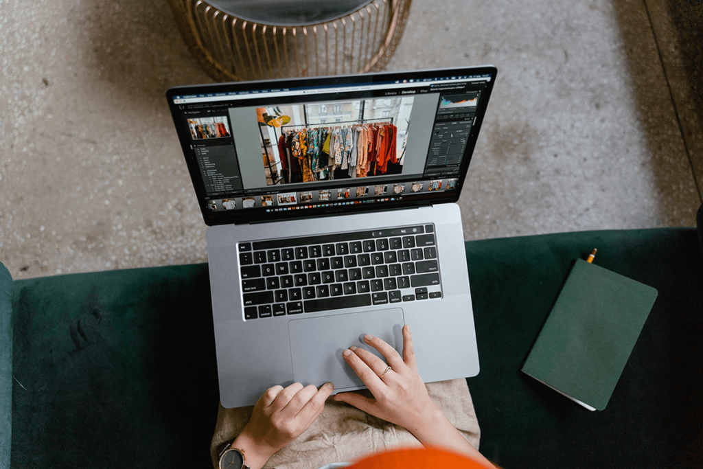 Laptop showing a fashion web shop, illustrating video experience and branding for commerce