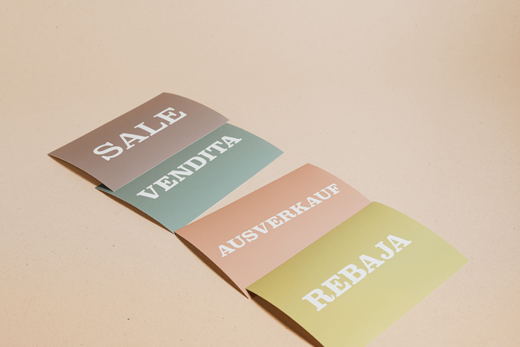 Sale signs in several languages, illustrating multilingual audio and subtitles for video