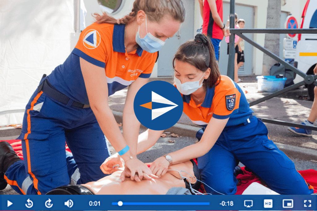 Paramedics practising CPR in a customizable video player for healthcare training