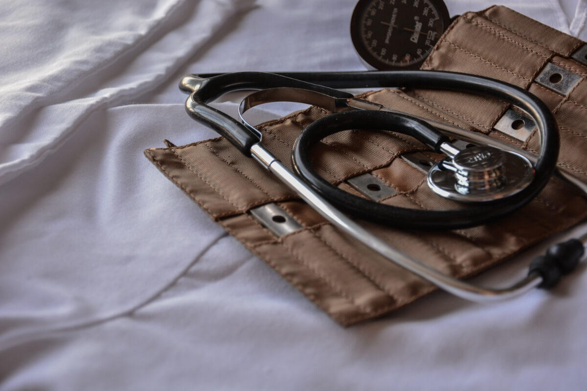 Stethoscope lying on a bed, illustrating streaming for healthcare
