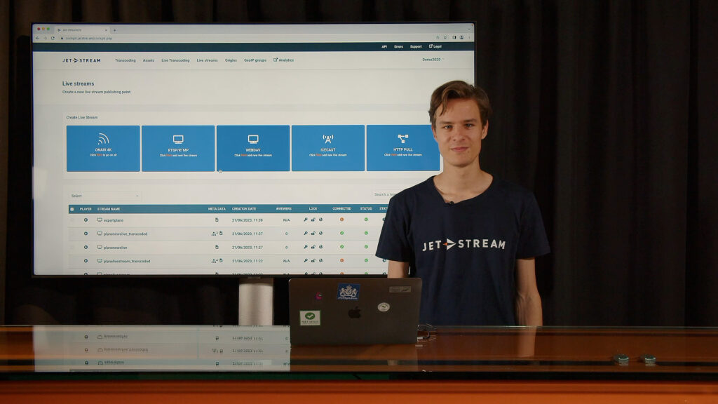 Presenter demonstrating live transcoding in Jet-Stream Cloud, demo video thumbnail