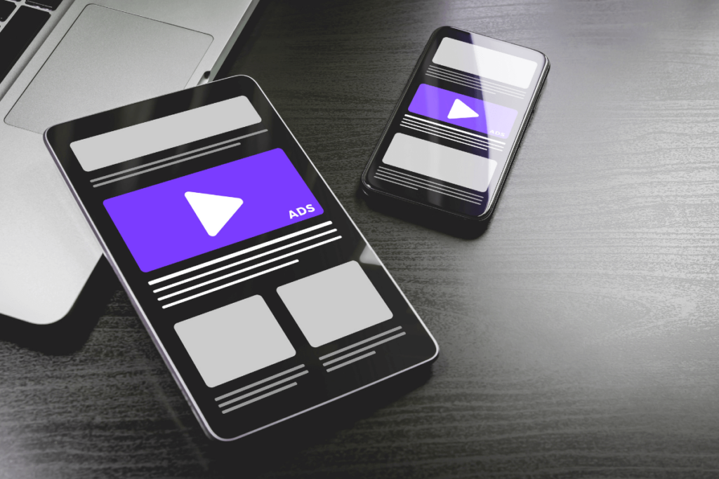 Smartphones showing an outstream video ad within an article