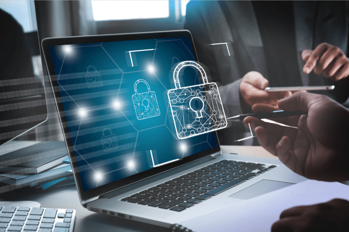 Laptop with a padlock symbol, illustrating DRM protection