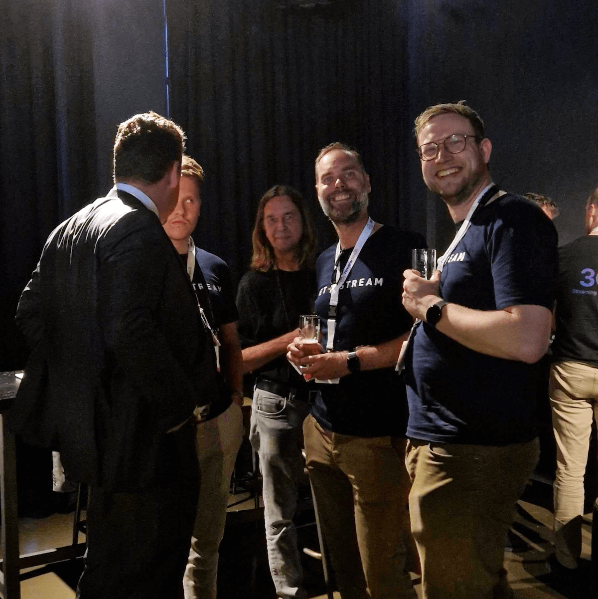Jet-Stream team celebrating at an evening event
