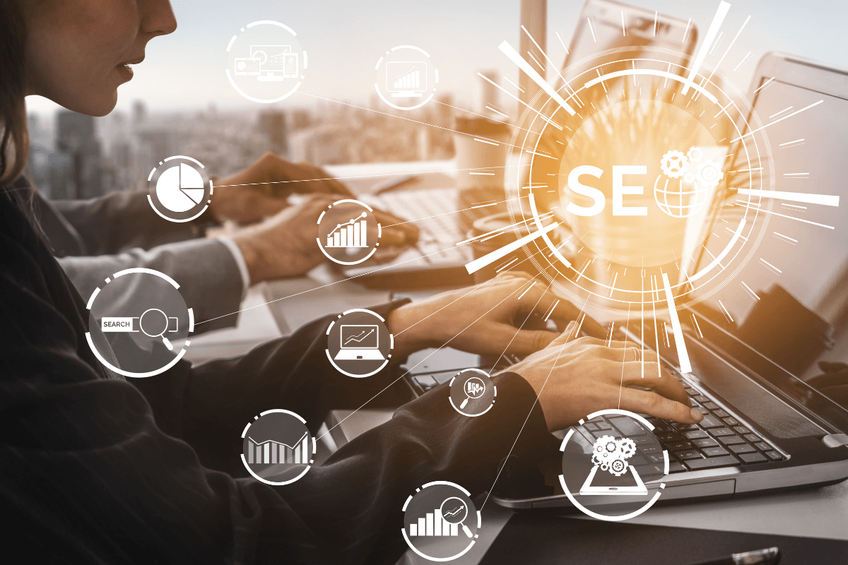 Person typing with SEO icons, illustrating improved SEO through multilingual streaming